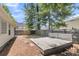 A large wooden deck is a feature of this level backyard, with trees providing plenty of shade at 172 Ashton Dr, Goose Creek, SC 29445