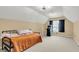 Spacious bedroom with a playful arcade game, offering comfort and versatility at 172 Ashton Dr, Goose Creek, SC 29445