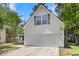 Charming home features a 2-car garage, light siding, and classic architecture, providing curb appeal at 172 Ashton Dr, Goose Creek, SC 29445