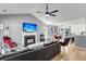 Comfortable living room featuring a fireplace, TV, vaulted ceiling, and wood flooring at 172 Ashton Dr, Goose Creek, SC 29445