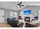 Bright living room with fireplace, large windows, and contemporary furnishings at 172 Ashton Dr, Goose Creek, SC 29445