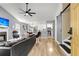 Open-concept living space with modern furnishings and a stylish kitchen, creating a seamless and inviting atmosphere at 172 Ashton Dr, Goose Creek, SC 29445
