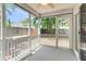 Enjoyable screened porch with ceiling fan and views of the backyard at 172 Ashton Dr, Goose Creek, SC 29445