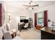 Cozy bedroom featuring neutral colors, a ceiling fan, and a comfortable workspace at 1723 Indaba Way, Charleston, SC 29414
