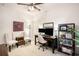 Well-decorated bedroom with modern lighting, a ceiling fan, and two chairs at 1723 Indaba Way, Charleston, SC 29414