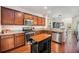 Bright kitchen with wood floors, stainless steel appliances, and ample cabinet space at 1723 Indaba Way, Charleston, SC 29414