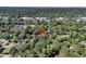 Aerial view showcasing the property's location within a lush green neighborhood; nature meets convenience at 1730 Harrison Ave, Charleston, SC 29407