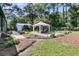 Inviting backyard featuring a gazebo with outdoor seating and well-maintained landscaping at 1730 Harrison Ave, Charleston, SC 29407