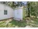 Exterior view of a backyard storage shed adjacent to the main home at 1730 Harrison Ave, Charleston, SC 29407