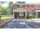 Charming townhouse exterior with a well-manicured landscape and inviting entrance at 1816 Mepkin Rd # B1, Charleston, SC 29407