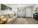 Inviting living room with hardwood floors, neutral paint, plush rug, and cozy sofa creates a warm and welcoming ambiance at 1816 Mepkin Rd # B1, Charleston, SC 29407