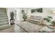 Inviting living room with hardwood floors, neutral paint, plush rug, and cozy sofa creates a warm and welcoming ambiance at 1816 Mepkin Rd # B1, Charleston, SC 29407