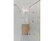 Bathroom with a modern vanity and a sleek glass-enclosed shower with marble tile at 19 Smith St # B, Charleston, SC 29401