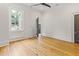 Bright bedroom featuring hardwood floors, a ceiling fan, and neutral paint colors at 19 Smith St # B, Charleston, SC 29401