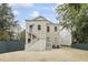 Rear exterior with an inviting stairwell leading to the home's second-story entrance at 19 Smith St # B, Charleston, SC 29401