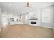 Bright and airy living room with a fireplace and an open layout connecting to the kitchen at 190 Steepbrook Dr, Summerville, SC 29486
