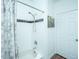 Clean bathroom features a shower and tub combination with a white tile surround at 1928 Chatelain Way, Mount Pleasant, SC 29464