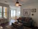 Cozy living room featuring ceiling fan, modern decor, and comfortable seating at 1928 Chatelain Way, Mount Pleasant, SC 29464