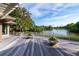 Expansive deck with scenic lake views, perfect for outdoor gatherings and enjoying the tranquil surroundings at 200 Belted Kingfisher Rd, Kiawah Island, SC 29455