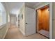 Spacious hallway with an elevator and neutral carpeting for accessibility and convenience at 200 Belted Kingfisher Rd, Kiawah Island, SC 29455