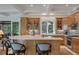 A kitchen with wooden cabinets and trim along with an island at 200 Belted Kingfisher Rd, Kiawah Island, SC 29455