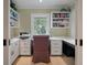 Well-lit home office with built-in shelves and storage, perfect for remote work at 200 Belted Kingfisher Rd, Kiawah Island, SC 29455