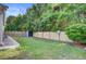 Fenced backyard with mature trees offers a private outdoor space at 2008 Welsh Pony Dr, Mount Pleasant, SC 29429