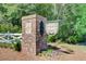 A community entrance is adorned with brick signage and well-maintained landscaping at 2008 Welsh Pony Dr, Mount Pleasant, SC 29429