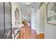 Inviting foyer with a decorative mirror and console table and view into the living room at 2008 Welsh Pony Dr, Mount Pleasant, SC 29429