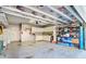 Organized garage featuring storage cabinets and workbench, providing practical space at 2008 Welsh Pony Dr, Mount Pleasant, SC 29429