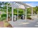 Outdoor grill area with a pergola, offering a space for barbecue and socializing at 2008 Welsh Pony Dr, Mount Pleasant, SC 29429