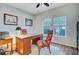 An elegant office area featuring a desk, leather chairs, natural light, and wood flooring at 2008 Welsh Pony Dr, Mount Pleasant, SC 29429