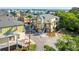 Beautiful aerial view of colorful homes, palm trees, and lush green landscape in a coastal neighborhood at 204 Michigan Ave B3 # 16, Folly Beach, SC 29439