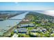 Expansive aerial shot of the coastline featuring homes, beaches, and a stunning view of the ocean at 204 Michigan Ave B3 # 16, Folly Beach, SC 29439