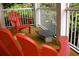 Relaxing outdoor balcony with comfortable seating and a view of lush greenery at 204 Michigan Ave B3 # 16, Folly Beach, SC 29439