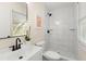 This bathroom features a tiled shower, modern vanity and fixtures, and is bright and airy at 205 Owens Dr, Summerville, SC 29485