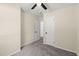 This bedroom features neutral walls and carpet, a ceiling fan, and closet at 205 Owens Dr, Summerville, SC 29485