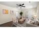 Cozy living room with hardwood floors, a ceiling fan, neutral-colored walls, and stylish furniture at 205 Owens Dr, Summerville, SC 29485