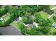 Aerial view of the property with a wooded area, pond, fountain, and two homesites at 206 Chaussee Blvd, Summerville, SC 29483