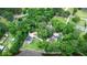 Aerial view of two homes, outbuildings, wooded area and circular driveway at 206 Chaussee Blvd, Summerville, SC 29483