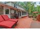 Exterior showcasing back deck, manicured lawn, and beautiful landscape design, perfect for outdoor living at 206 Chaussee Blvd, Summerville, SC 29483