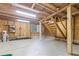 Unfinished basement with concrete floor and wooden beams, offering potential for customization at 206 Chaussee Blvd, Summerville, SC 29483