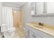 Cozy bathroom with vintage vanity, shower, and tile flooring at 206 Chaussee Blvd, Summerville, SC 29483