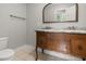 Bathroom vanity featuring a marble top and antique wood dresser at 206 Chaussee Blvd, Summerville, SC 29483