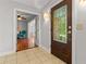 Lovely entryway featuring tile flooring, a glass front door, and a view into the living area at 206 Chaussee Blvd, Summerville, SC 29483