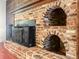 Rustic brick fireplace adds warmth and character at 206 Chaussee Blvd, Summerville, SC 29483