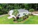 Well maintained, one-story garage with a metal roof and beautiful landscaping at 206 Chaussee Blvd, Summerville, SC 29483