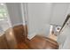 Hallway with hardwood floors leading down steps at 206 Chaussee Blvd, Summerville, SC 29483