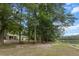 Picturesque lakeside home with access to the lake and a serene outdoor setting at 206 Chaussee Blvd, Summerville, SC 29483