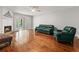Spacious living room with fireplace, hardwood floors, and natural lighting at 206 Chaussee Blvd, Summerville, SC 29483